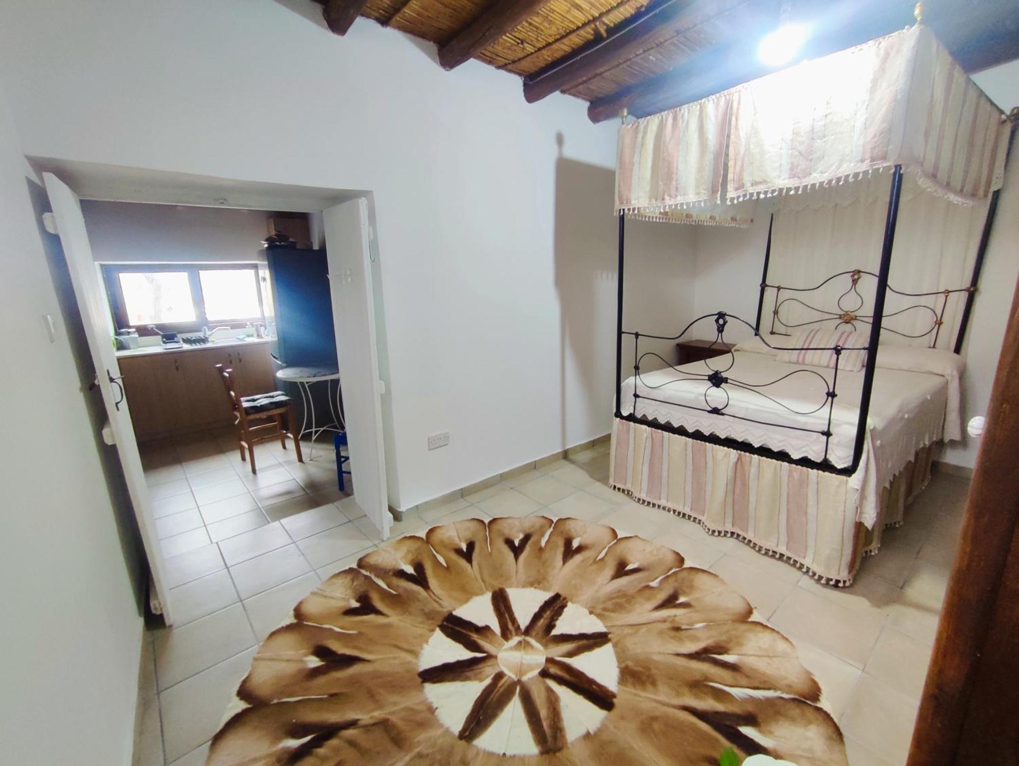 Faith'S Stone House Guest House Simou Luaran gambar